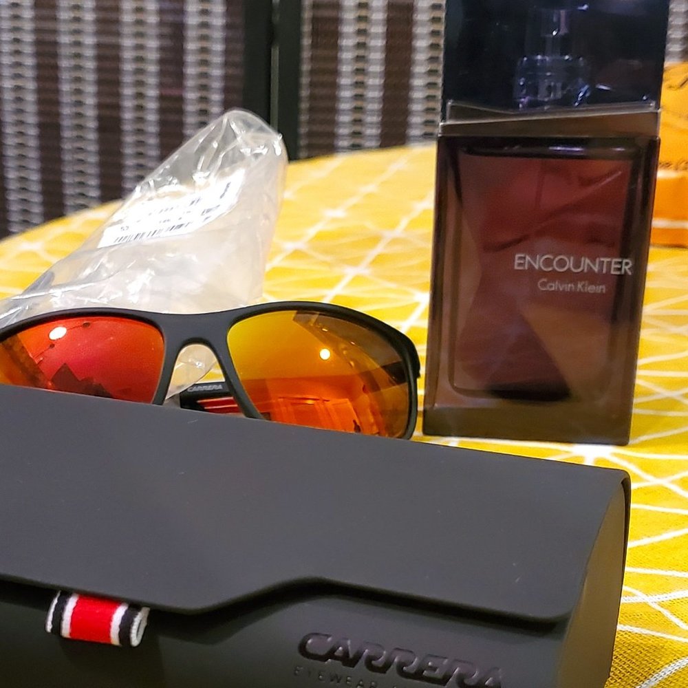 Carrera Sunshades and Cologne by Calvin Klein( Encounter)
